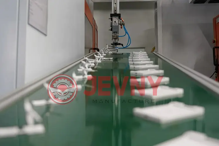 Automated injection molding production at Jevny Manufacturing